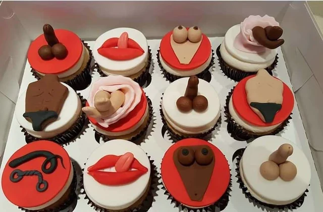 Cheeky party cupcakes by Kakey Mae. Playful fondant decorations in red, black, and white for an adult party theme.