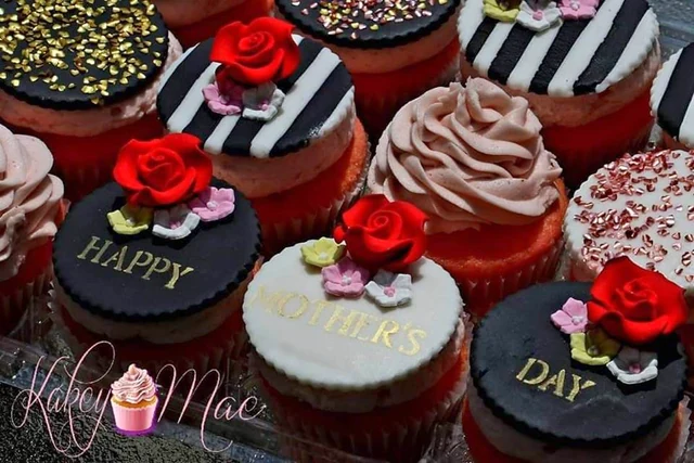 Roses & stripes by Kakey Mae. Red rose-shaped decorations, black-and-white stripes, and personalized message toppers.