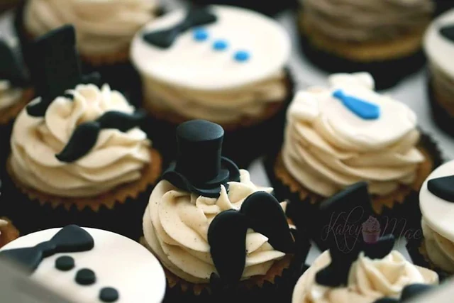 Top hats & bow ties by Kakey Mae. A closer look at coordinated hats, mustaches, and blue bow-tie details.